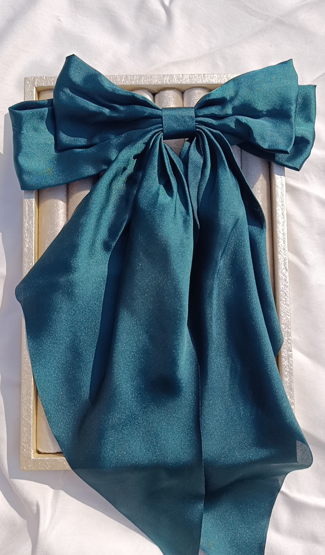 The Emerald Drape Bow